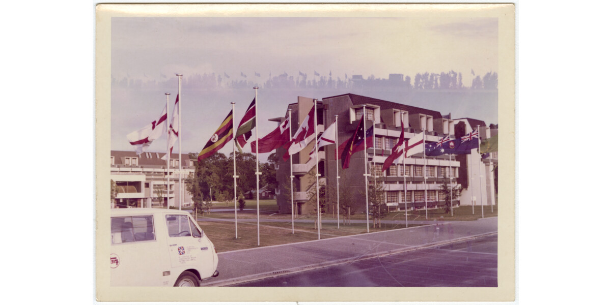 Flags outside the Commonwealth Games Village discoverywall.nz