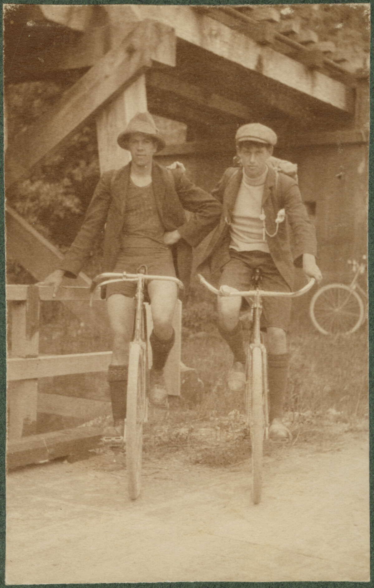 Two cyclists. 1900s. Christchurch City Libraries Photo Hunt. In copyright. CCL-PH19-0040