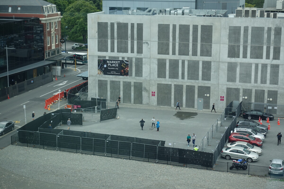 Colour photo of MIQ exercise yard on Colombo St, next to Crowne Plaza hotel