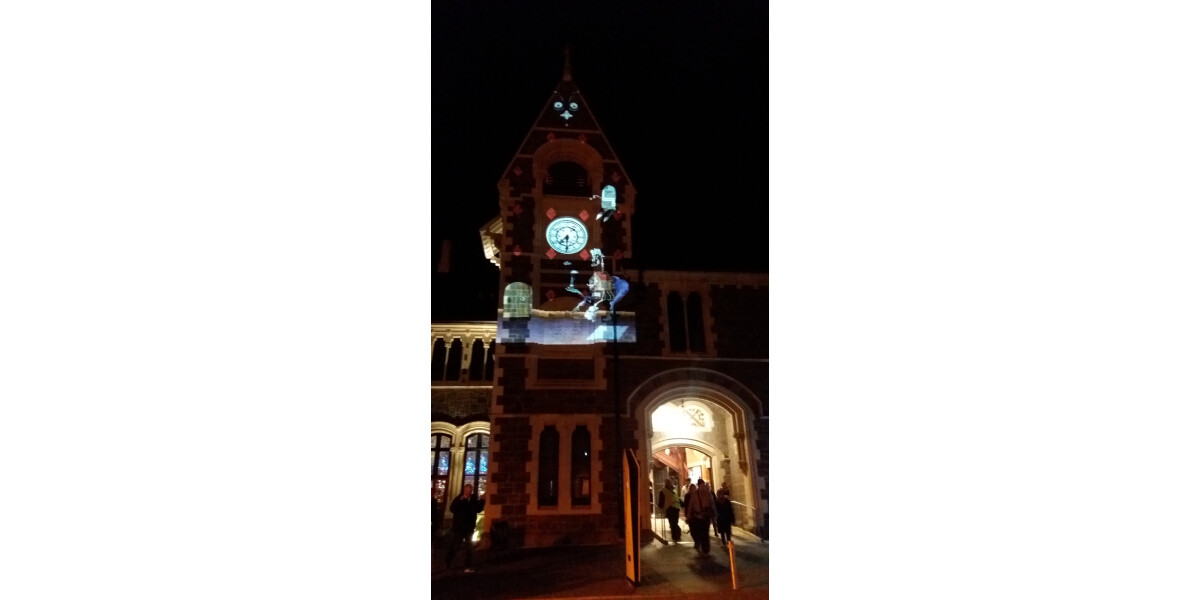 Light projection on Arts Centre clock tower discoverywall.nz