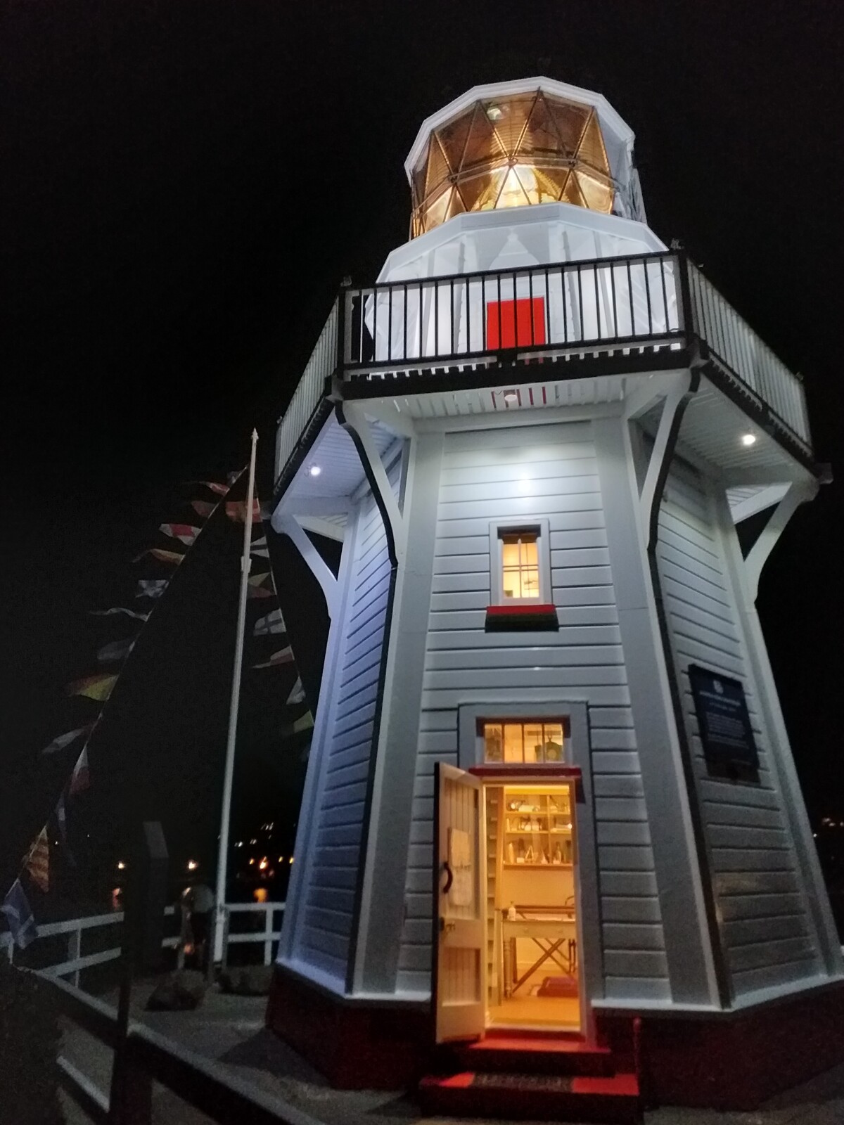 Akaroa Lighthouse lit up at night