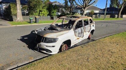 Burned out car on Emmett Street