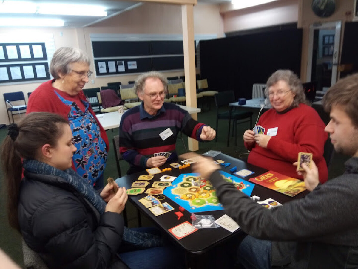 Oceania MathsJam Gathering 2021 attendees playing Catan